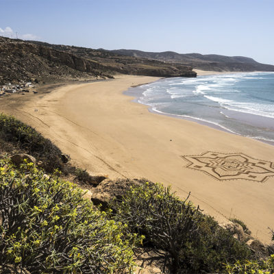 Iftane, beach art, sand drawing, dougados, morocco, essaouira