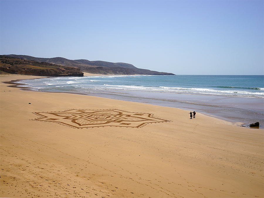 Iftane, beach art, sand drawing, dougados, morocco, essaouira